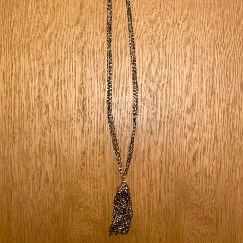 Long gold necklace with tassel